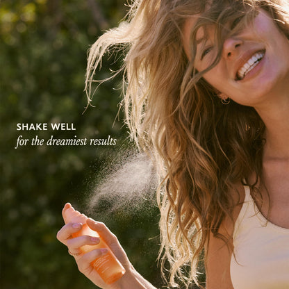 Small travel friendly hair and body fragrance bottle