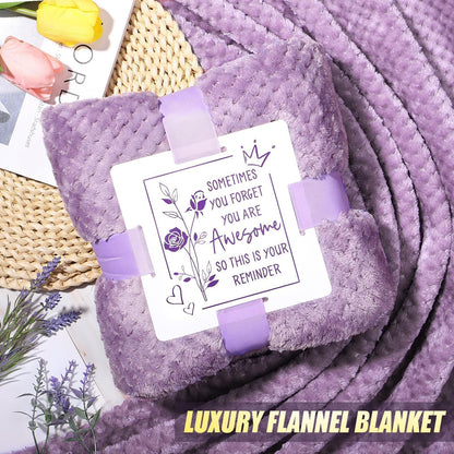 Lavender scented candle and bath bomb from Qinline care package