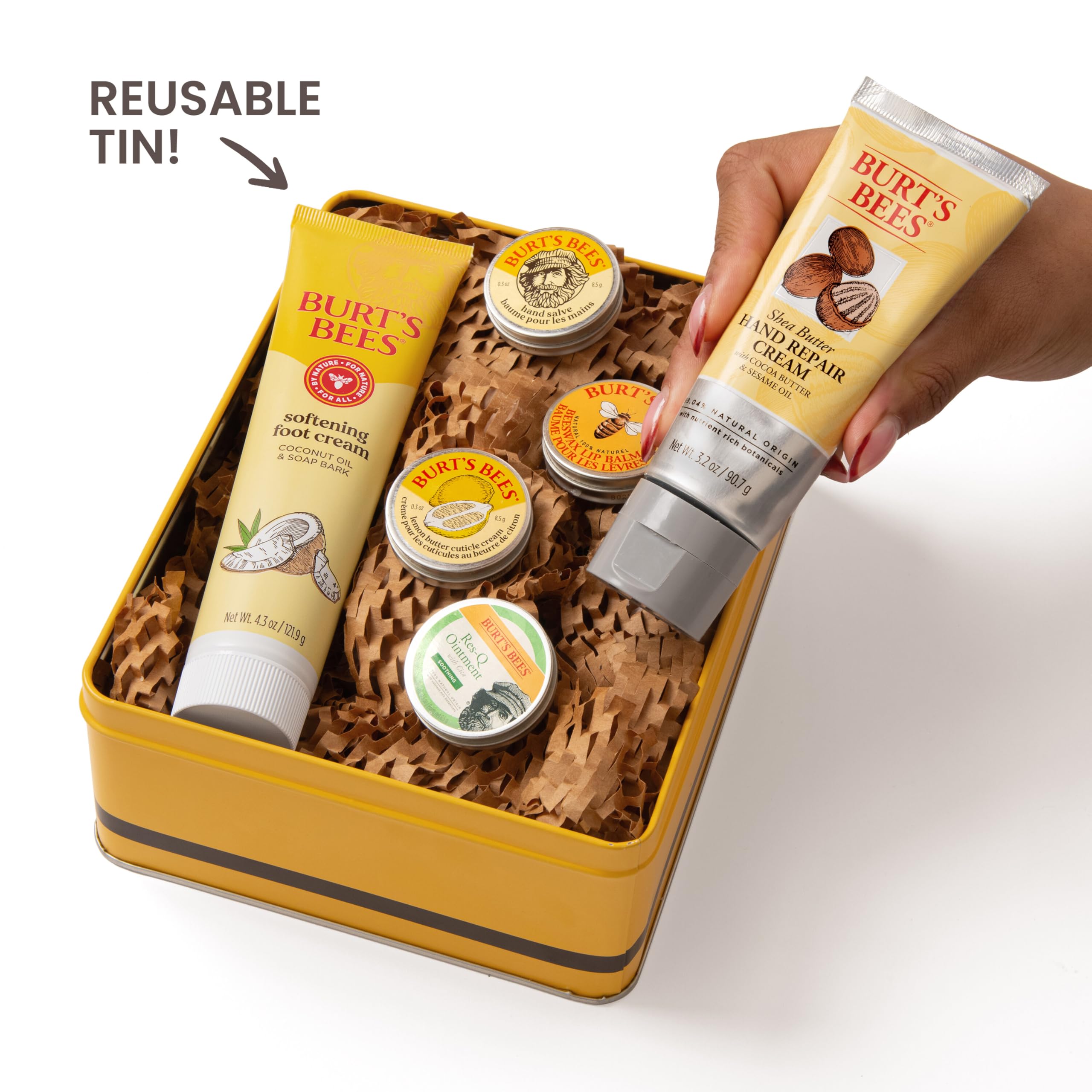 Burt's Bees travel sized body lotions hand creams and lip moisturizer arranged on a clean background
