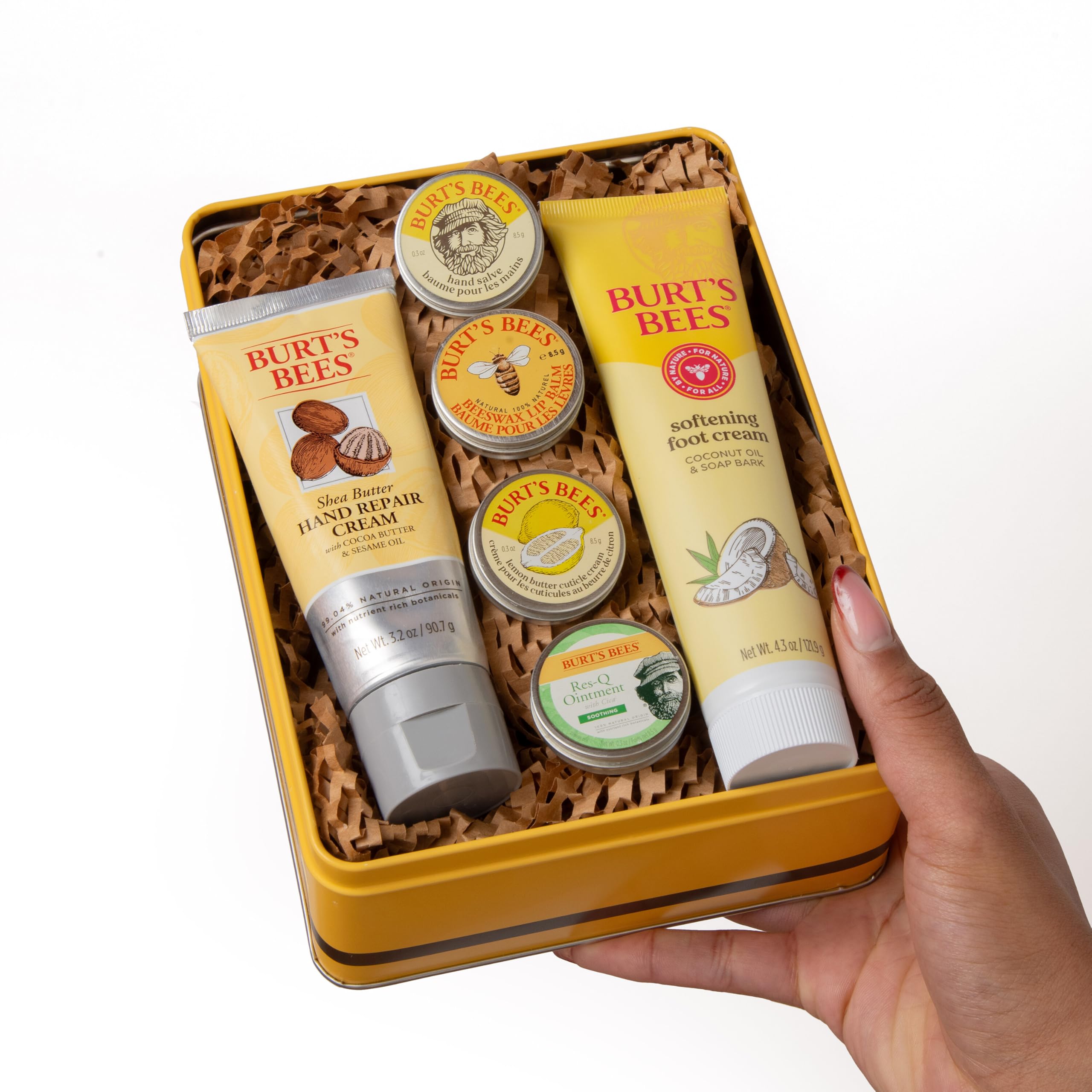 Close up of Burt's Bees lemon butter cuticle cream and beeswax lip balm for intensive moisture
