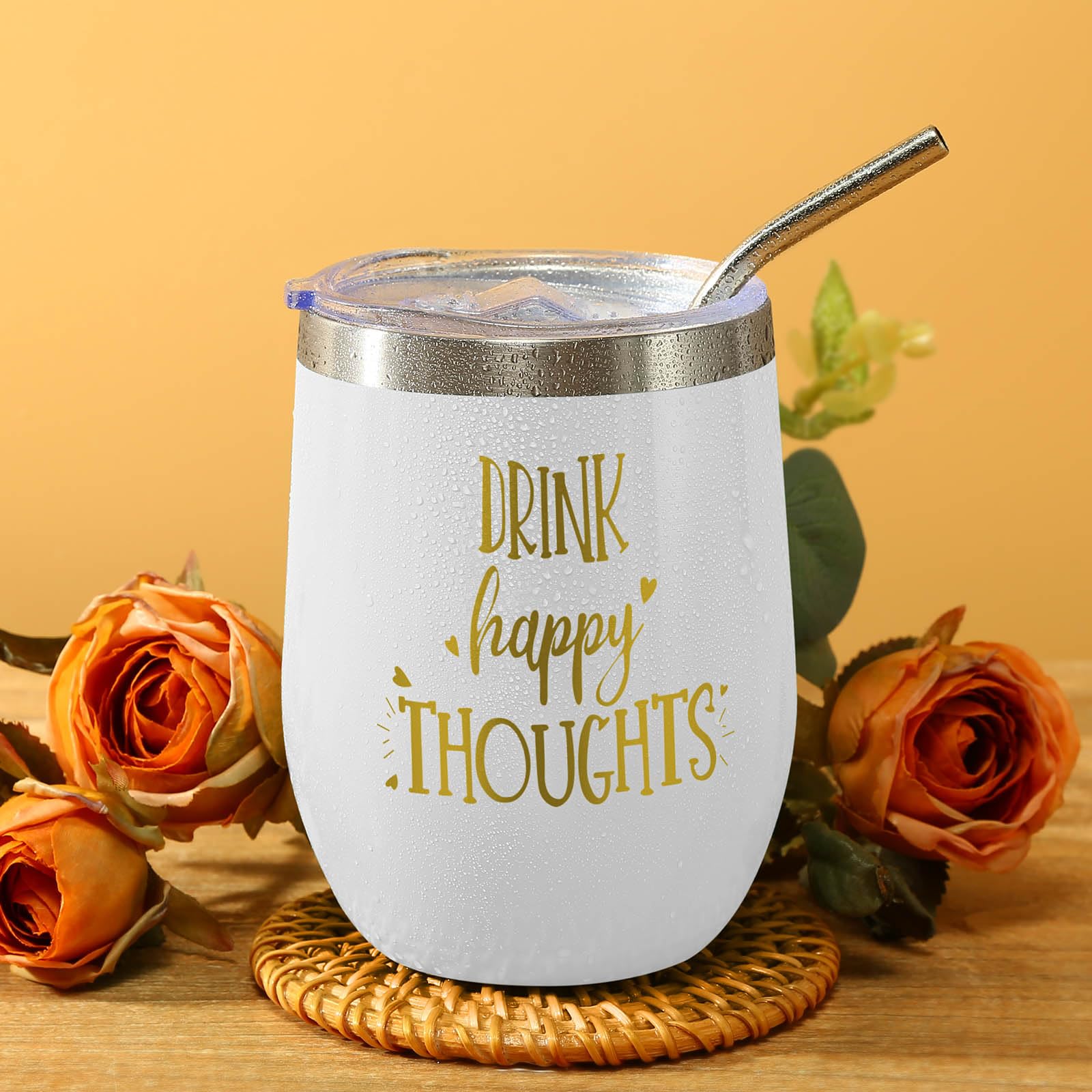 White insulated tumbler with Drink Happy Thoughts quote