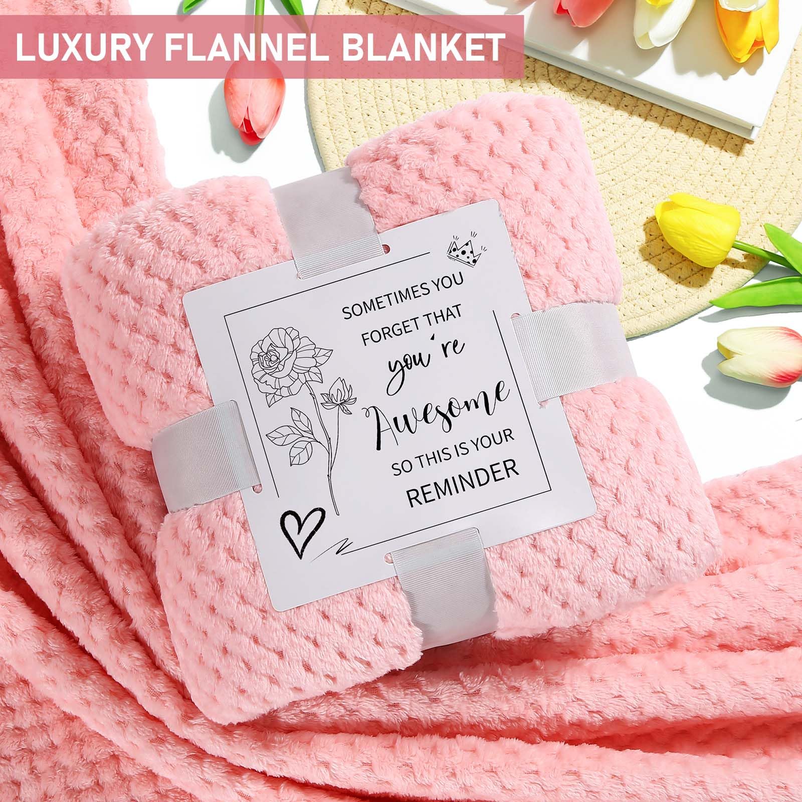 Soft pink flannel blanket and plush socks for relaxation