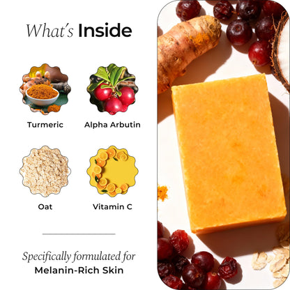 Glo Melanin turmeric soap being lathered for face and body skin evening