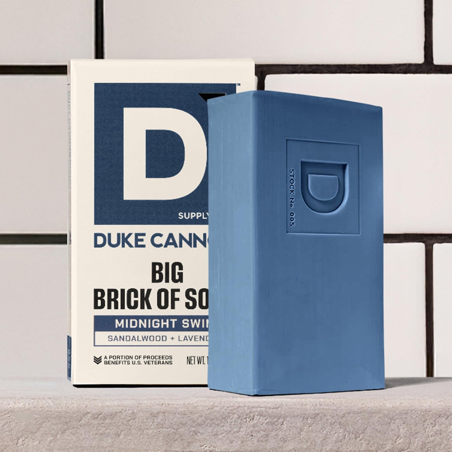 Close up view of Duke Cannon Midnight Swim packaging emphasizing the sulfate and paraben free formulation