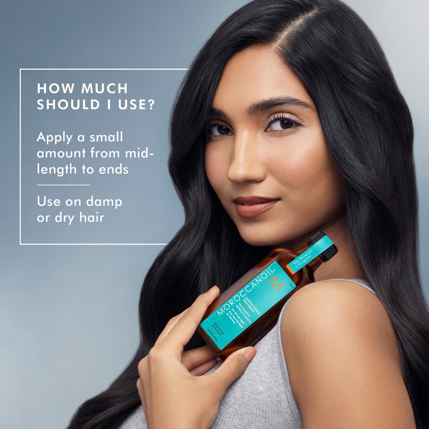 Moroccanoil styling foundation oil bottle alongside its protective blue box