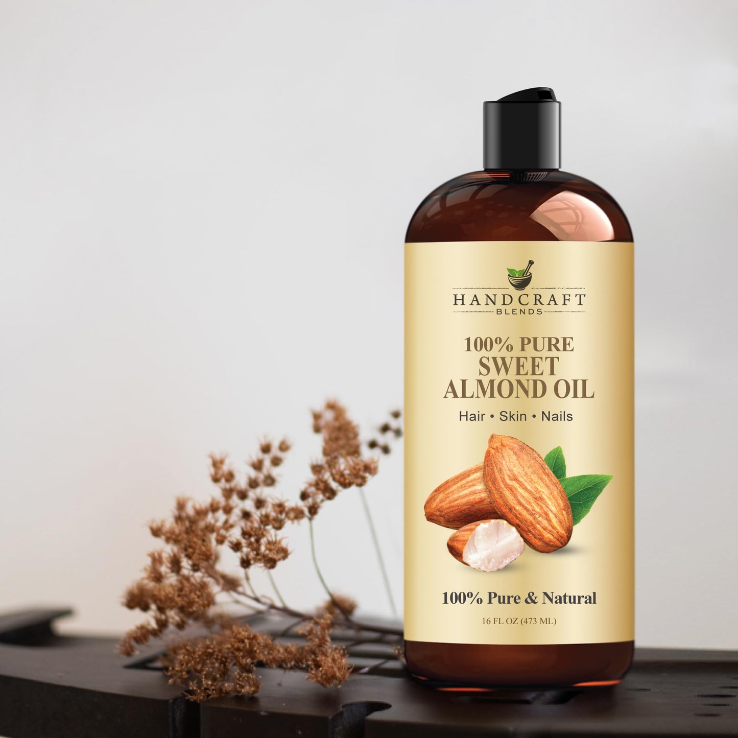 Back label view of Handcraft Blends pure almond oil showing clean ingredient details.