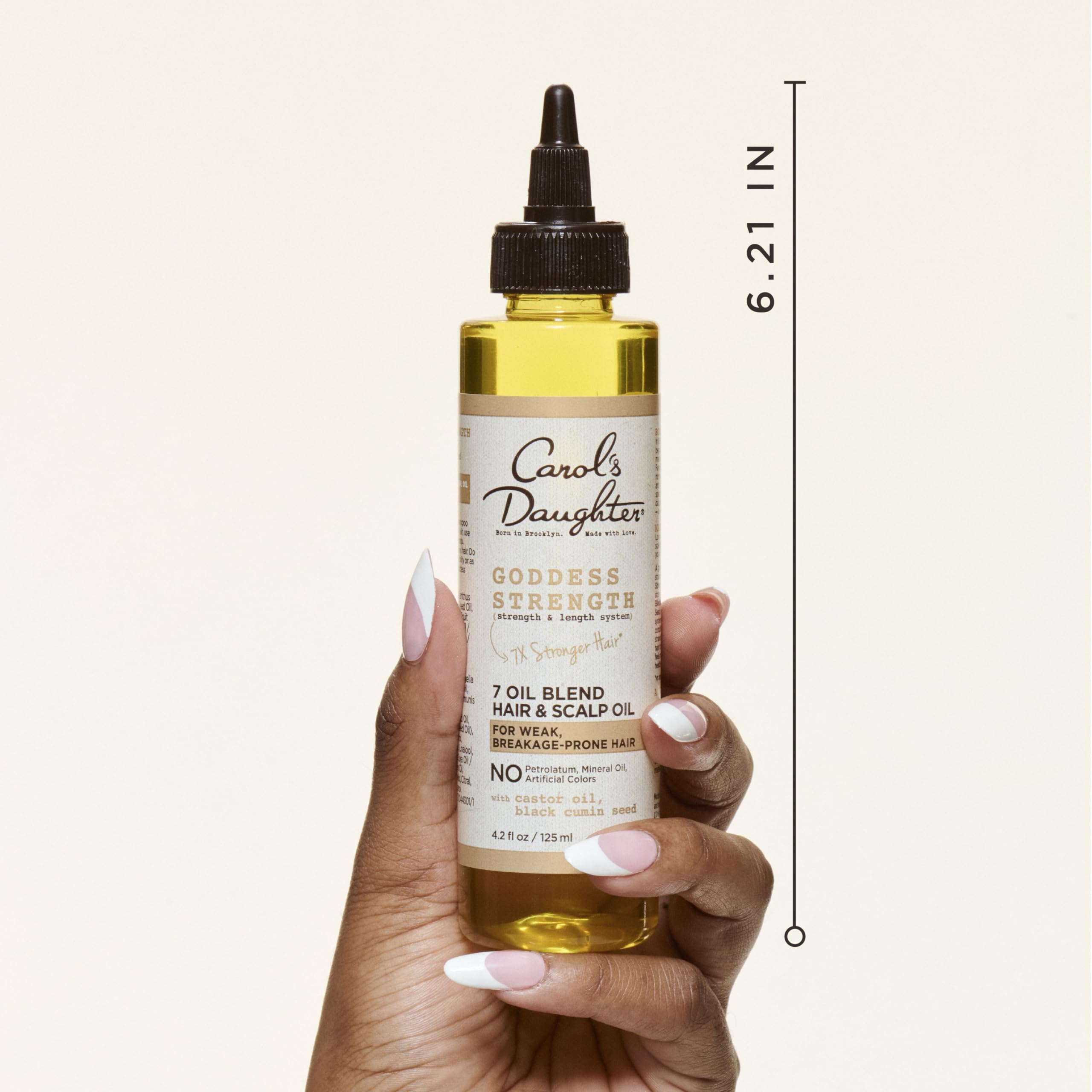 Carol's Daughter scalp and hair treatment with castor oil applicator tip