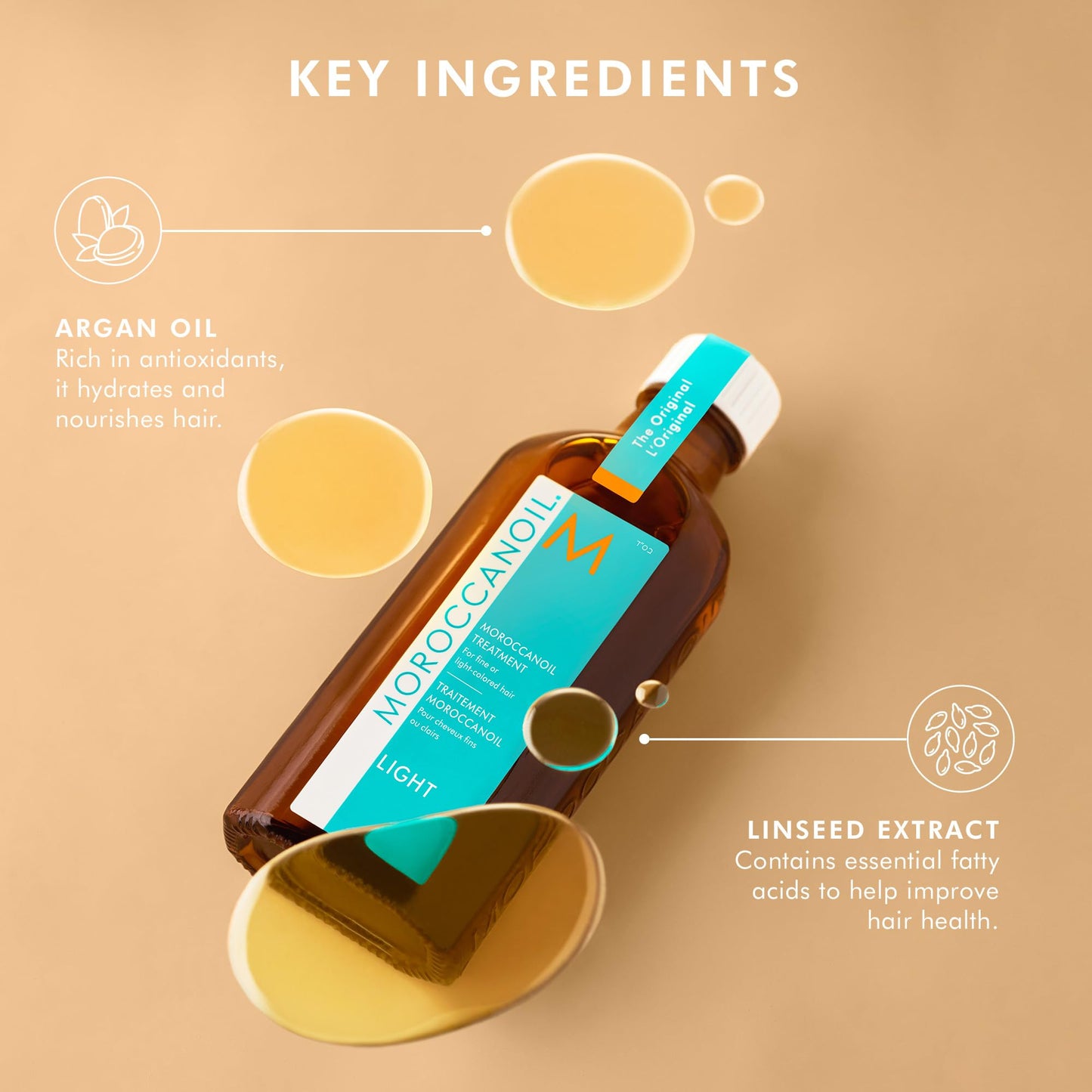 Moroccanoil Treatment Light 100ml amber glass bottle showing the dispensing pump