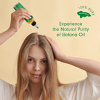 Dersie unrefined batana oil texture on fingertips close up view
