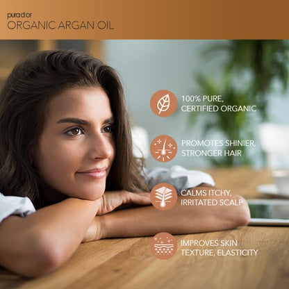 PURA D'OR 100% pure cold pressed virgin grade argan oil pump dispenser bottle on a clean background