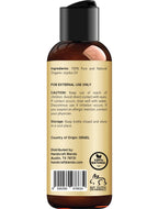 Lightweight texture of natural jojoba oil being dispensed for skin and hair hydration.
