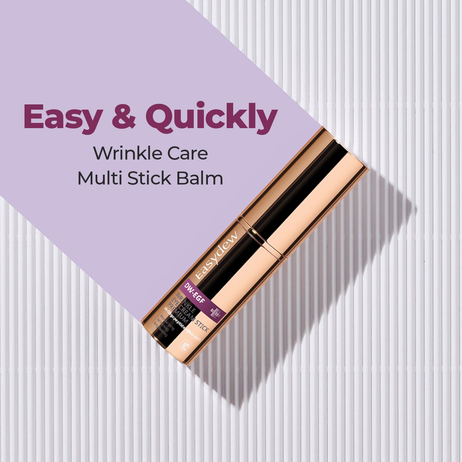 EASYDEW K-Beauty eye balm stick being applied directly under the eyes for wrinkle treatment.