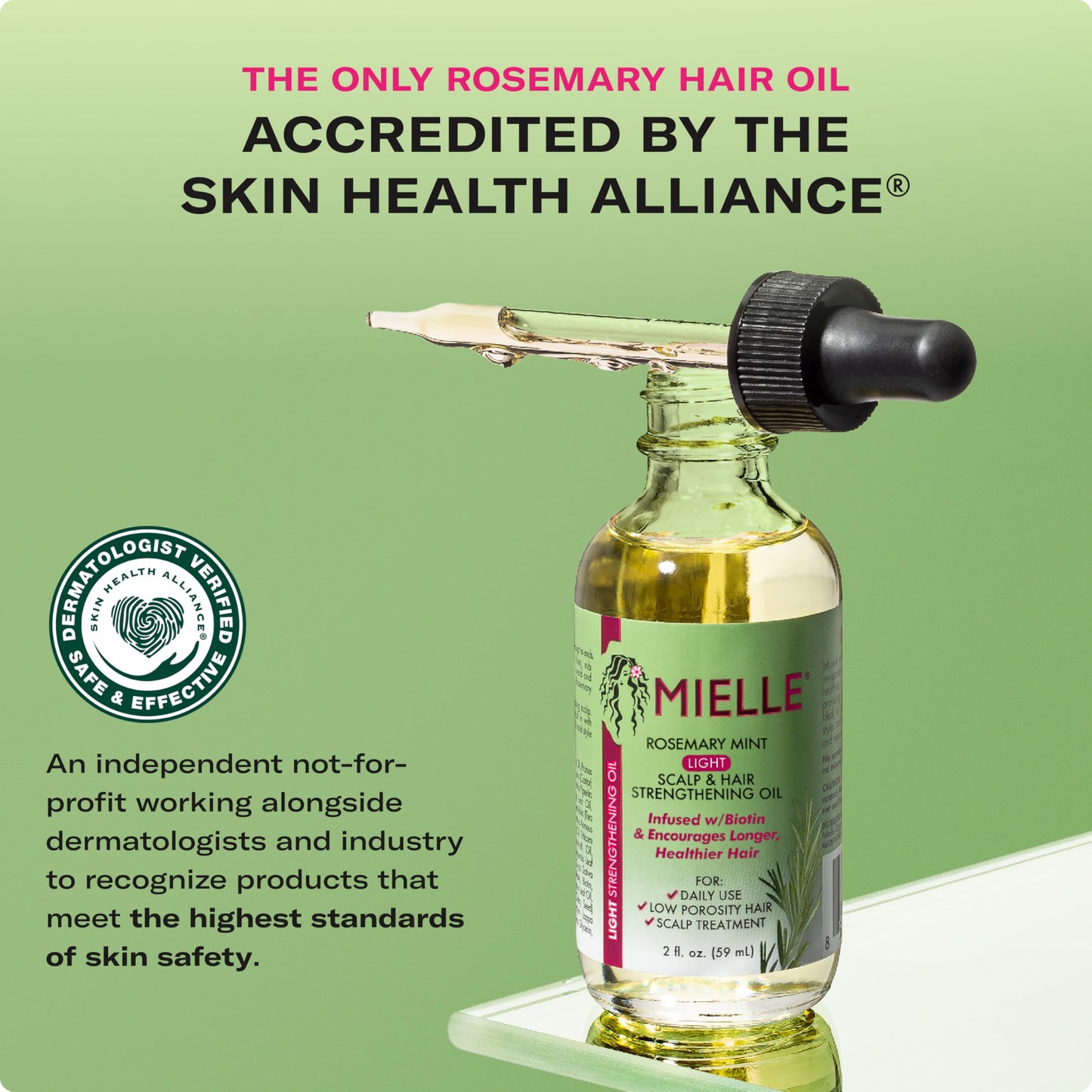 Mielle Organics rosemary mint light treatment showing clear dropper application details