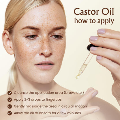 Cold pressed organic castor oil being applied to eyebrows with a precision spoolie brush.