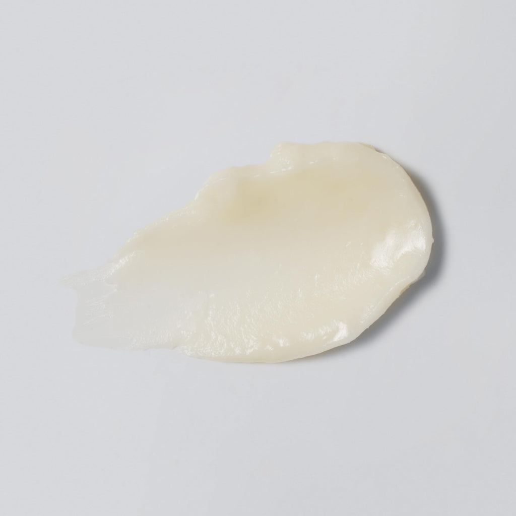 Versed Smooth Landing Advanced Retinoid Eye Balm open container showing rich balm texture