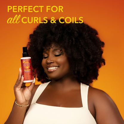 Argan oil leave in conditioner spray for frizz control and hydration close up