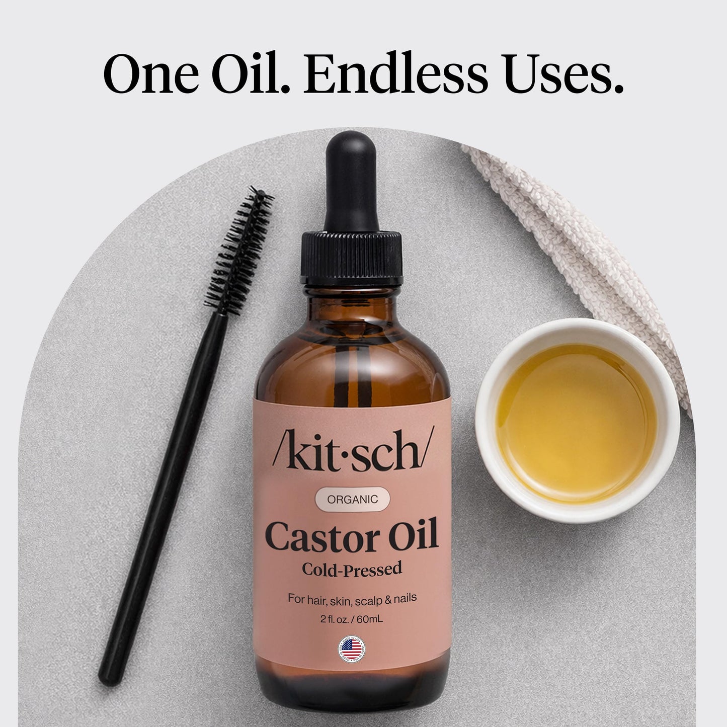 Two ounce glass bottle of Kitsch organic hair oil for women