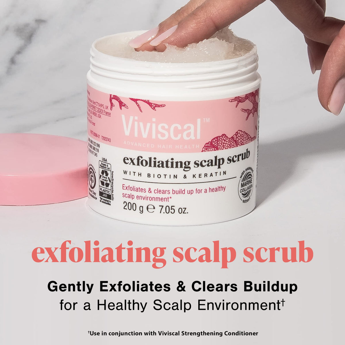 Close-up of Viviscal exfoliating scrub texture with sea salt grains