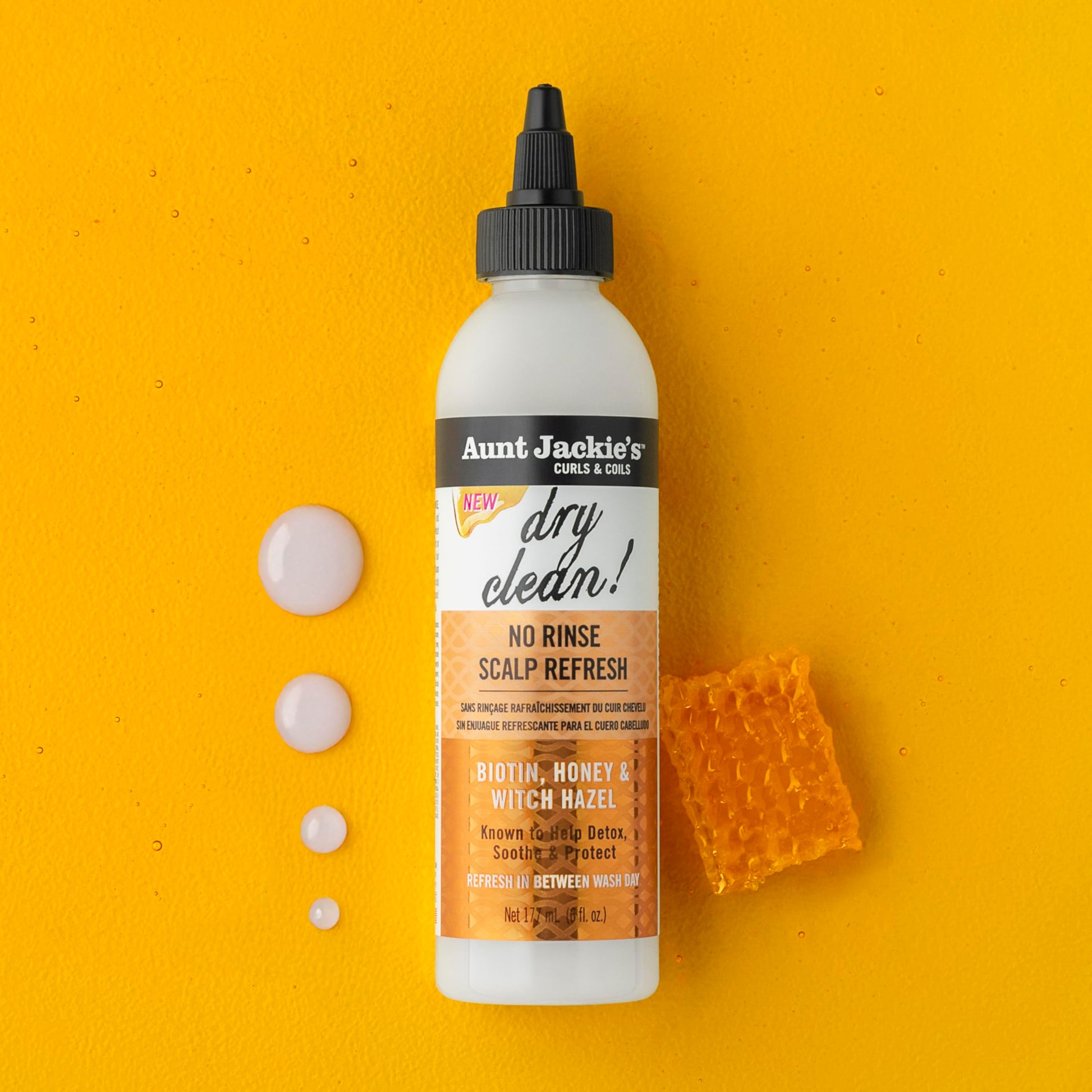 Close up of Aunt Jackie's scalp refresh texture and branding