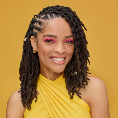Model using Aunt Jackie's scalp refresh on braided hair