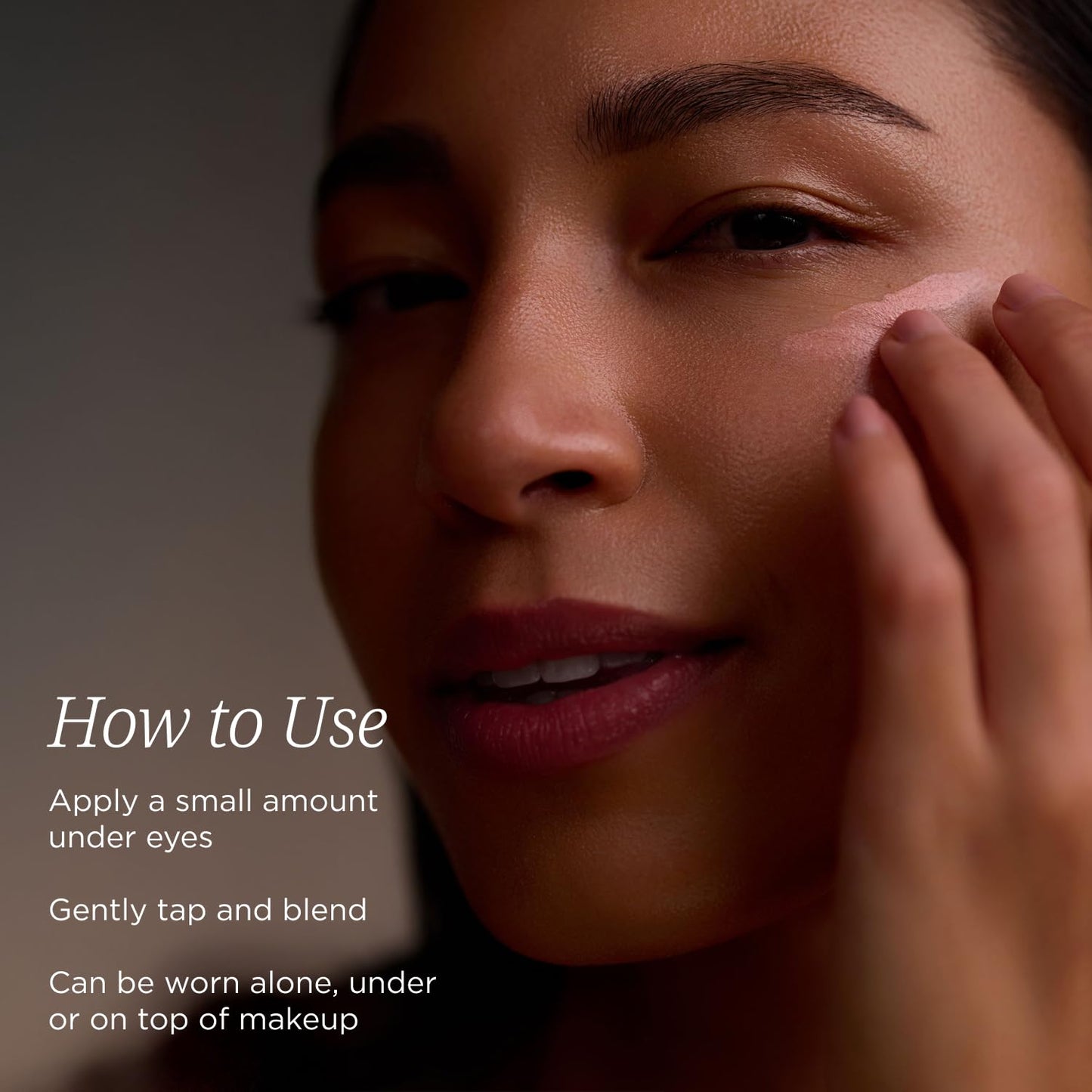Under eye treatment bottle with hyaluronic acid and caffeine closeup