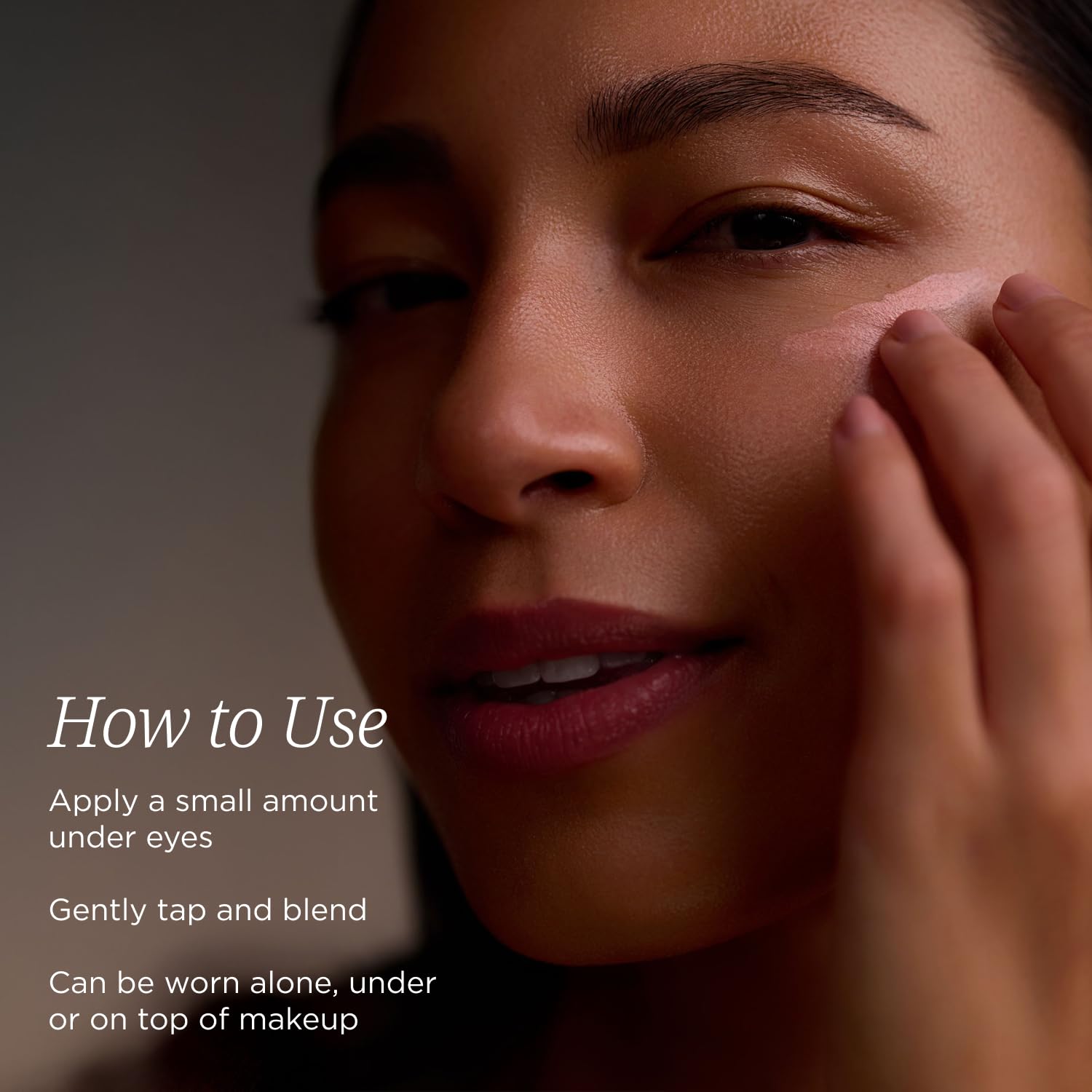 Under eye treatment bottle with hyaluronic acid and caffeine closeup