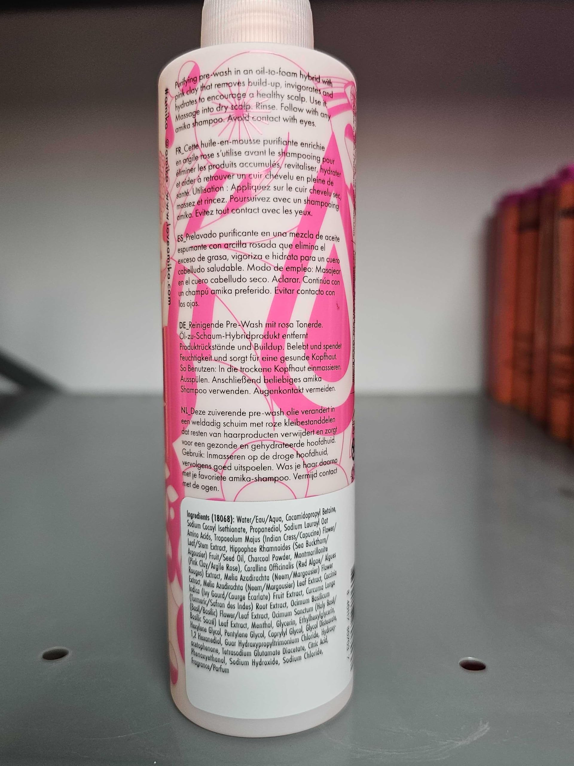 Amika Reset scalp treatment application on hair roots