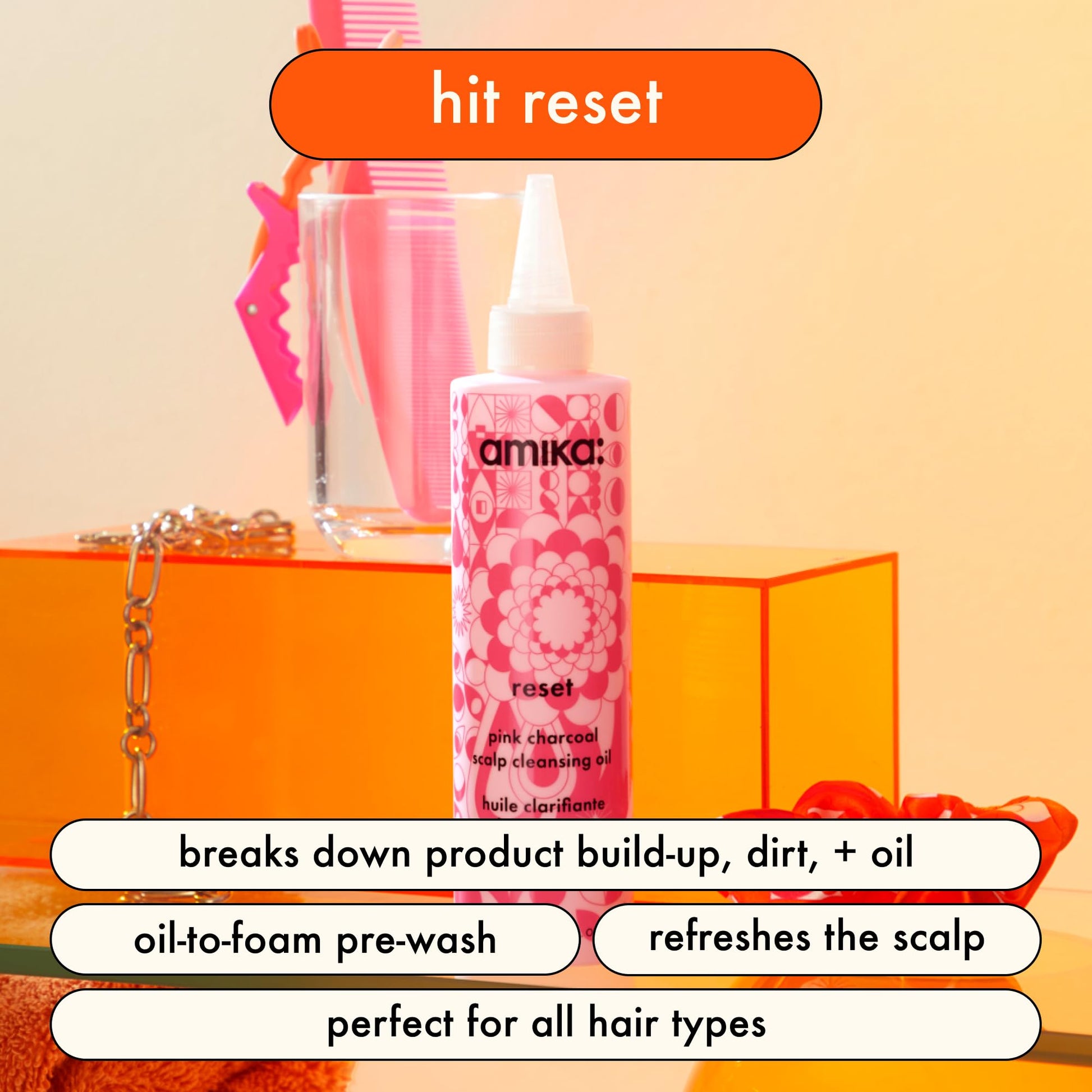 Amika Reset scalp cleansing oil bottle with ingredients list
