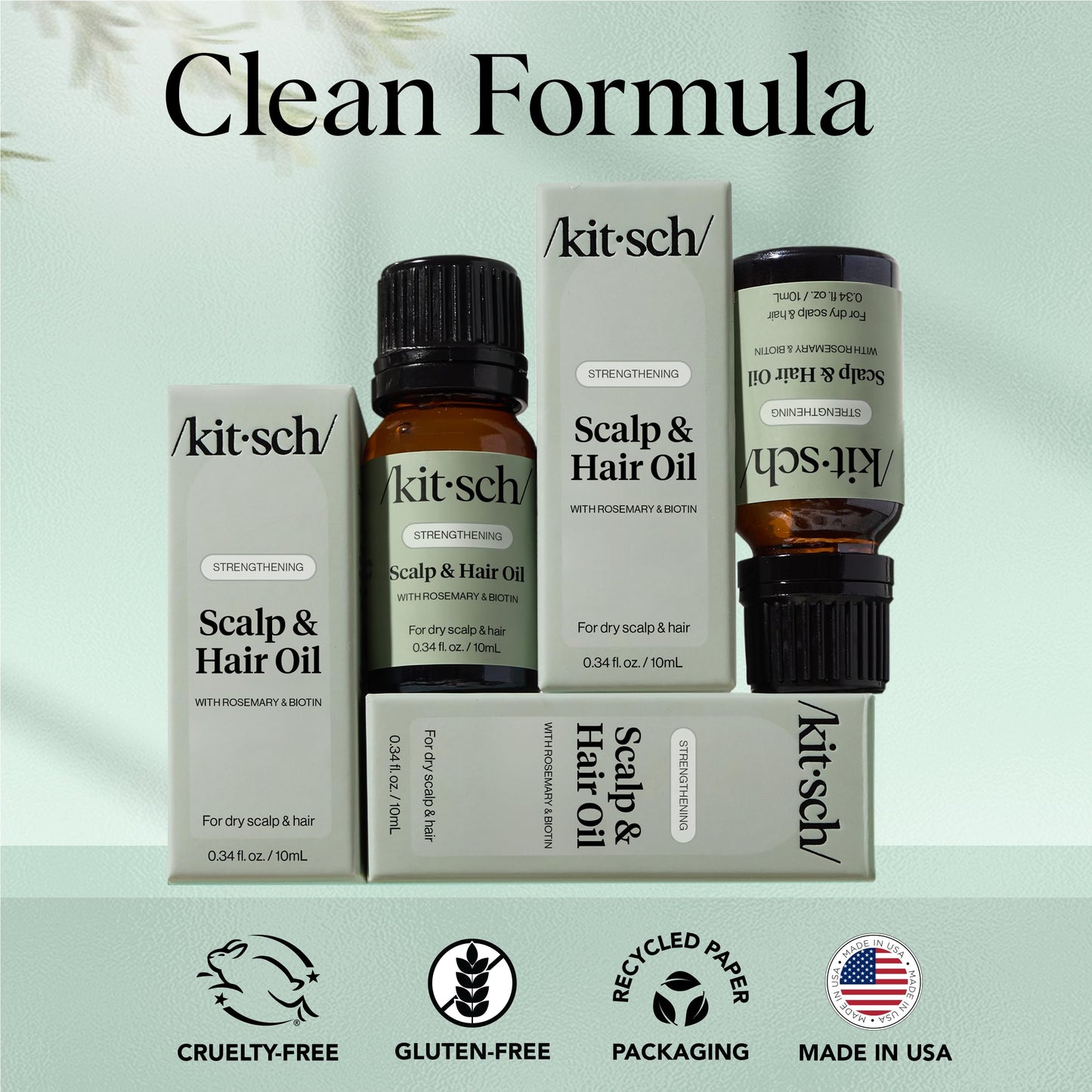 Travel size Kitsch hair growth oil 10mL bottle in hand