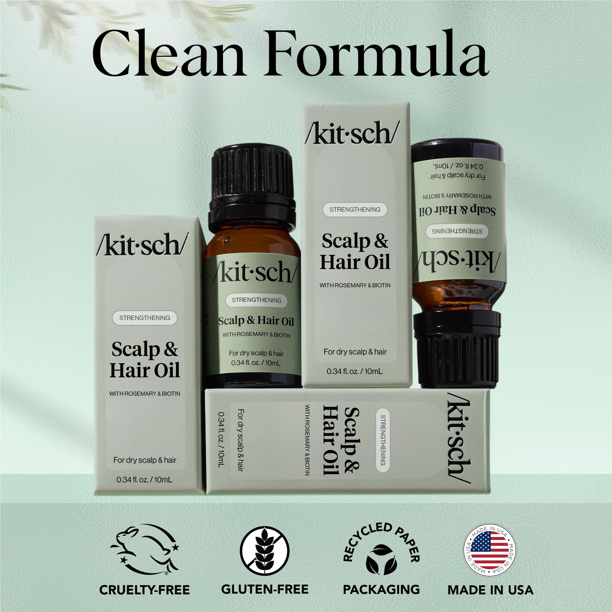 Travel size Kitsch hair growth oil 10mL bottle in hand
