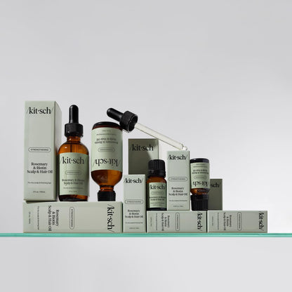 Kitsch strengthening oil applied to hair ends for shine