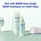Head and Shoulders Bare Scalp Relief Serum angled bottle display against white background.