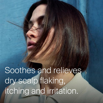 Living Proof Scalp Care treatment bottle with product name visible