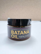 Qytin Batana Oil back view showing ingredients and instructions