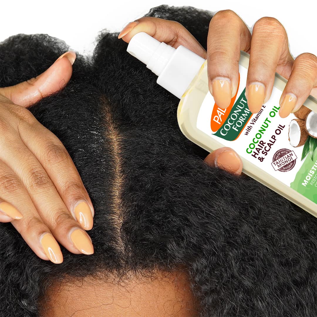 Close up of Palmers restorative hair oil spray packaging