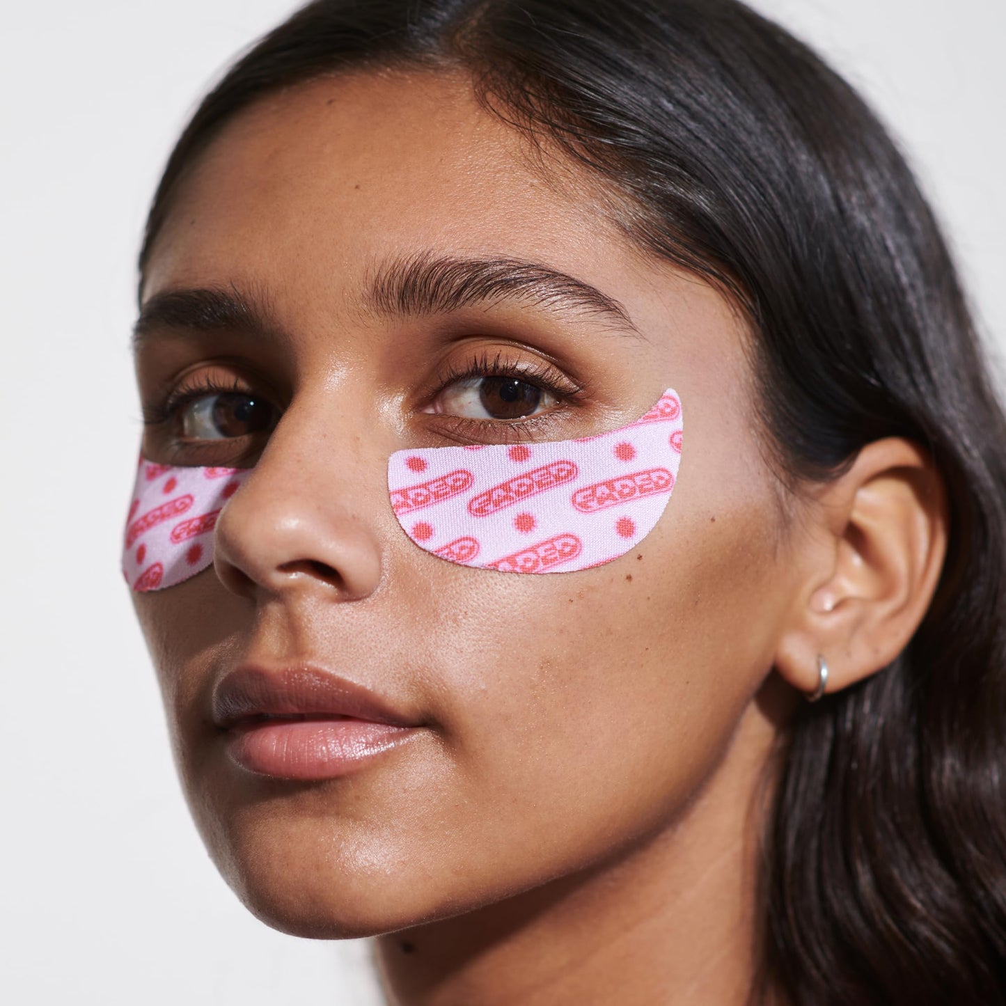 Skincare routine setup featuring authentic imported Topicals eye patches