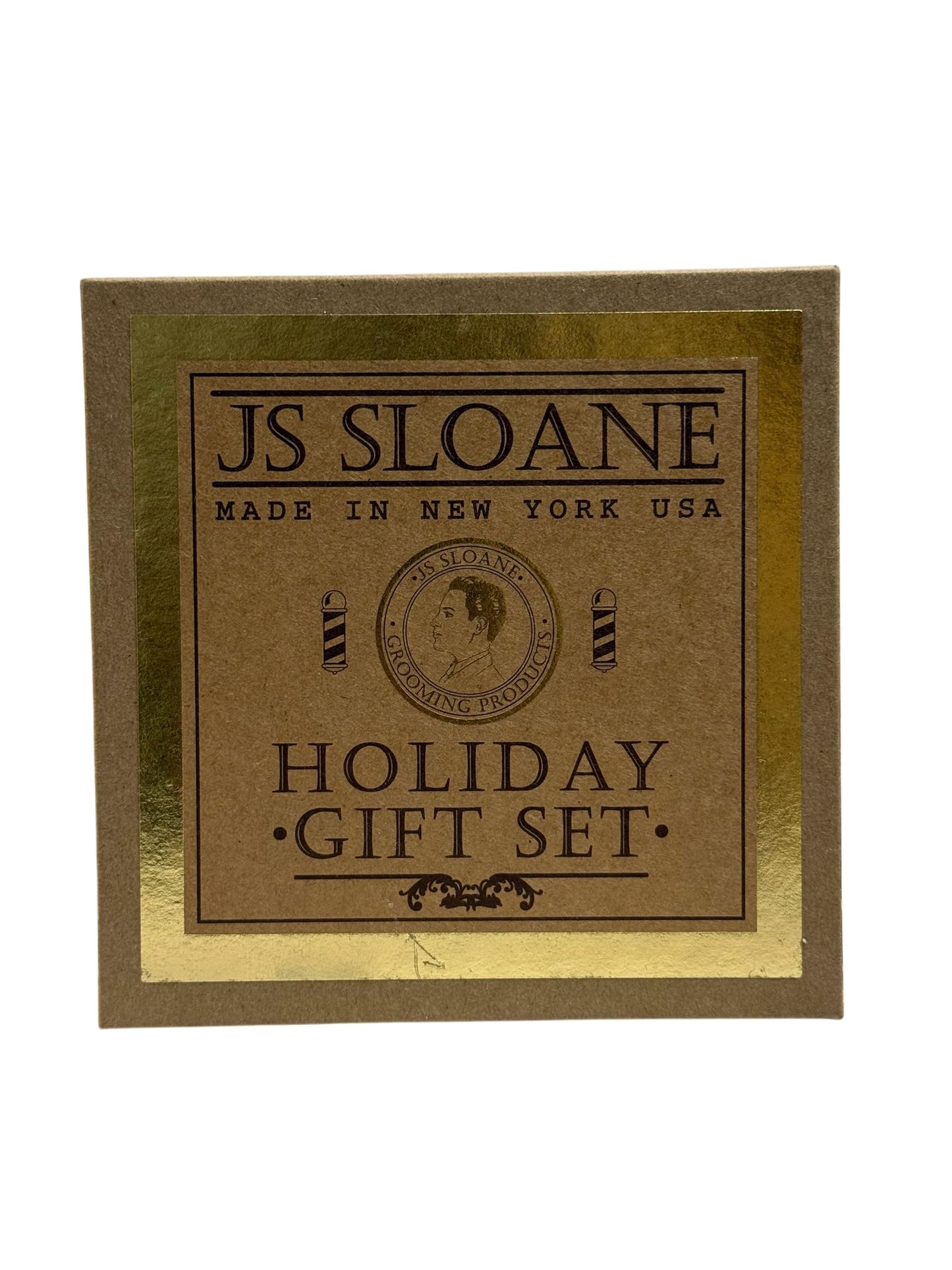 JS Sloane grooming set contents arranged on a table