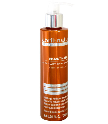 Close up of abril et nature Nature Plex salon grade bond building shampoo bottle for hair breakage prevention.