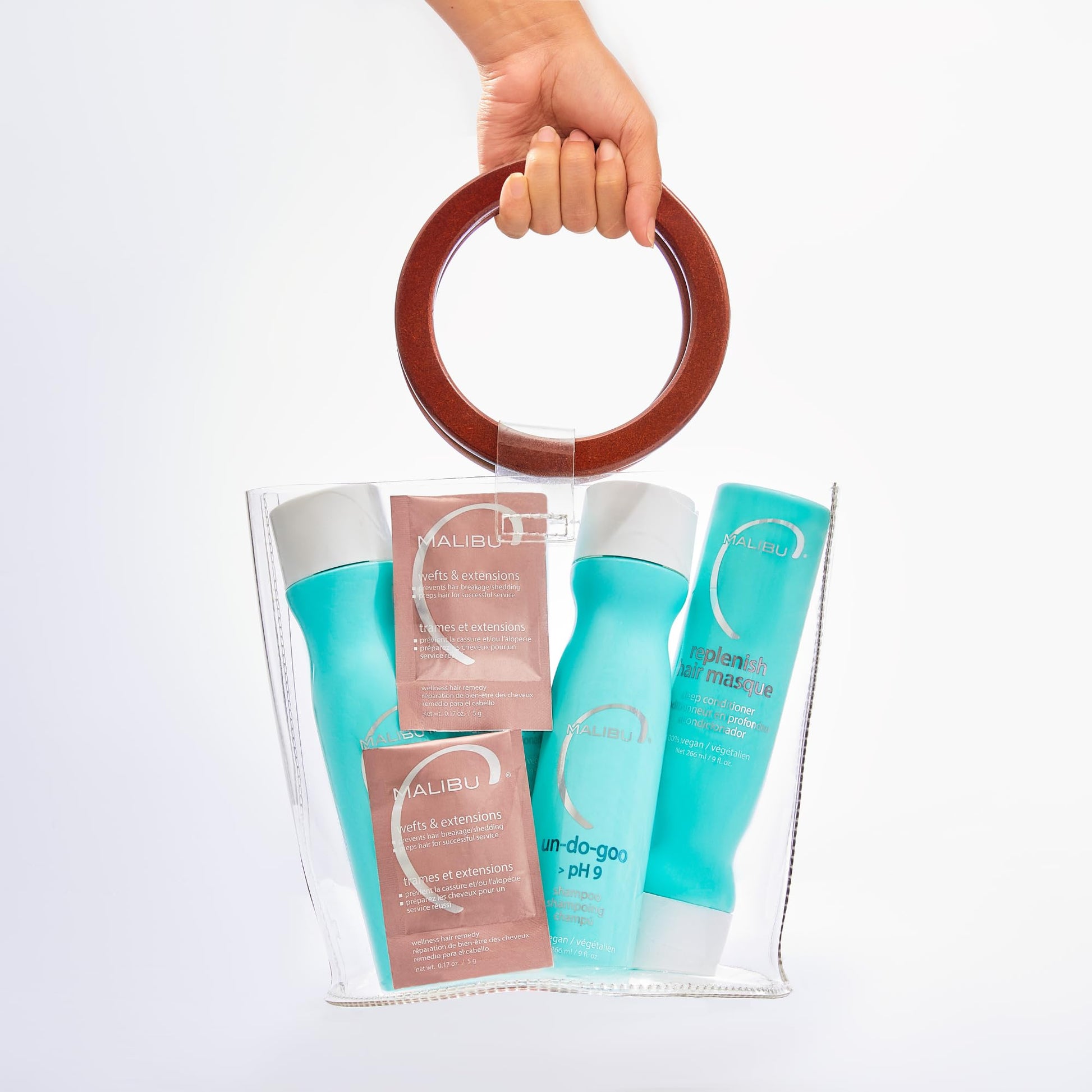 Malibu C hair extensions kit components on a white background for premium care