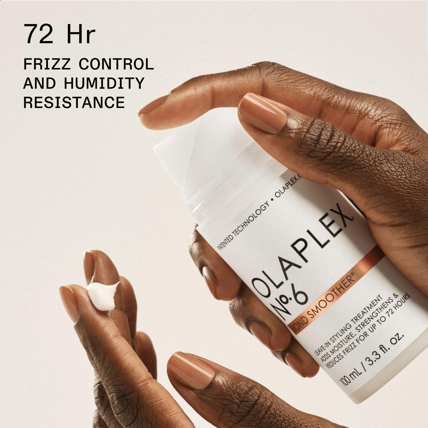 Olaplex Number 7 one fluid ounce packaging box next to the bottle.