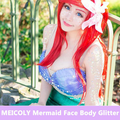 Holographic chunky face glitter applied to a models cheekbones for festival makeup
