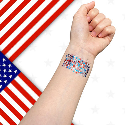 Mysense multi-use patriotic body glitter being swiped gently onto hair and collarbones for a festival look.