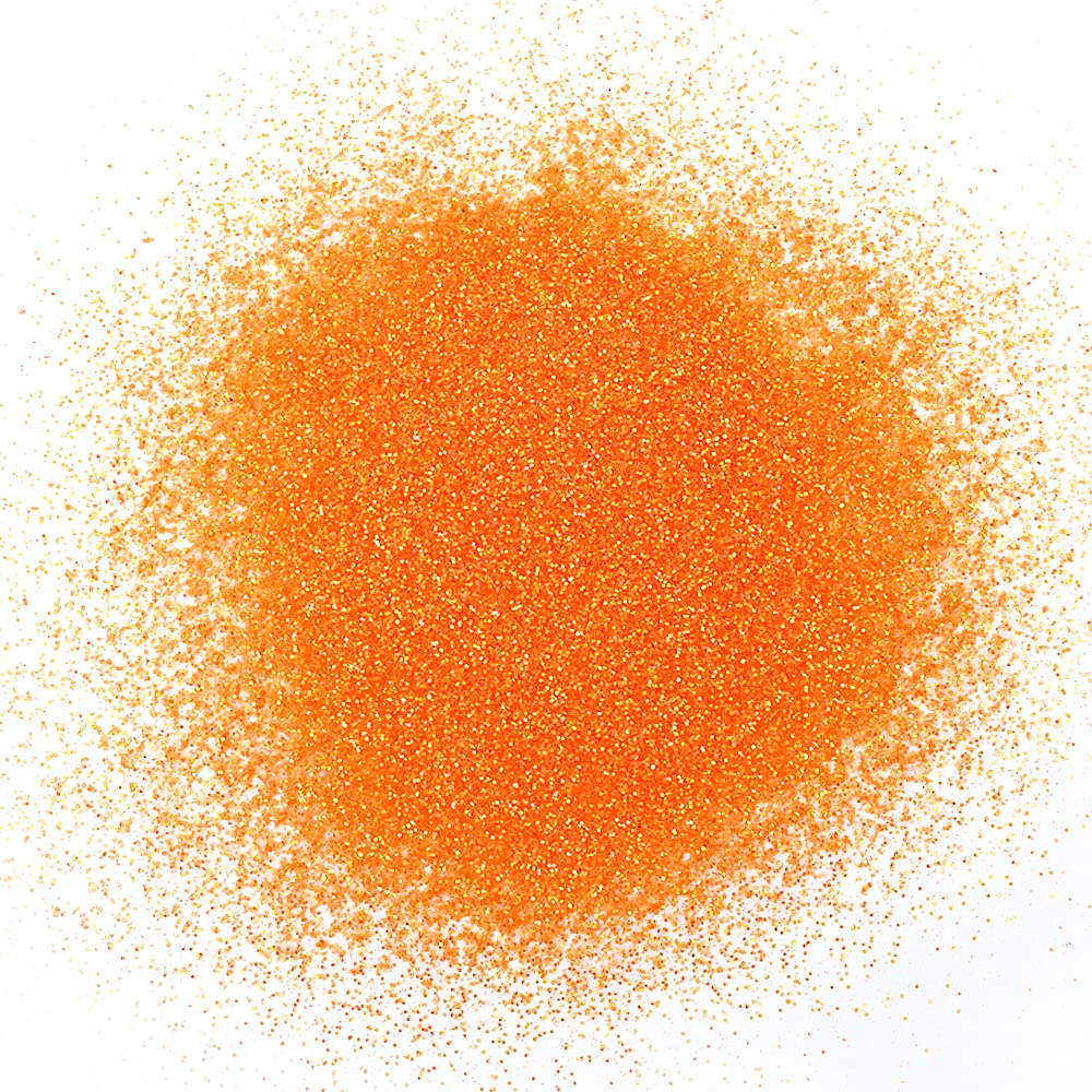 Cosmetic application of fine iridescent glitter powder on nail art and festival makeup styles