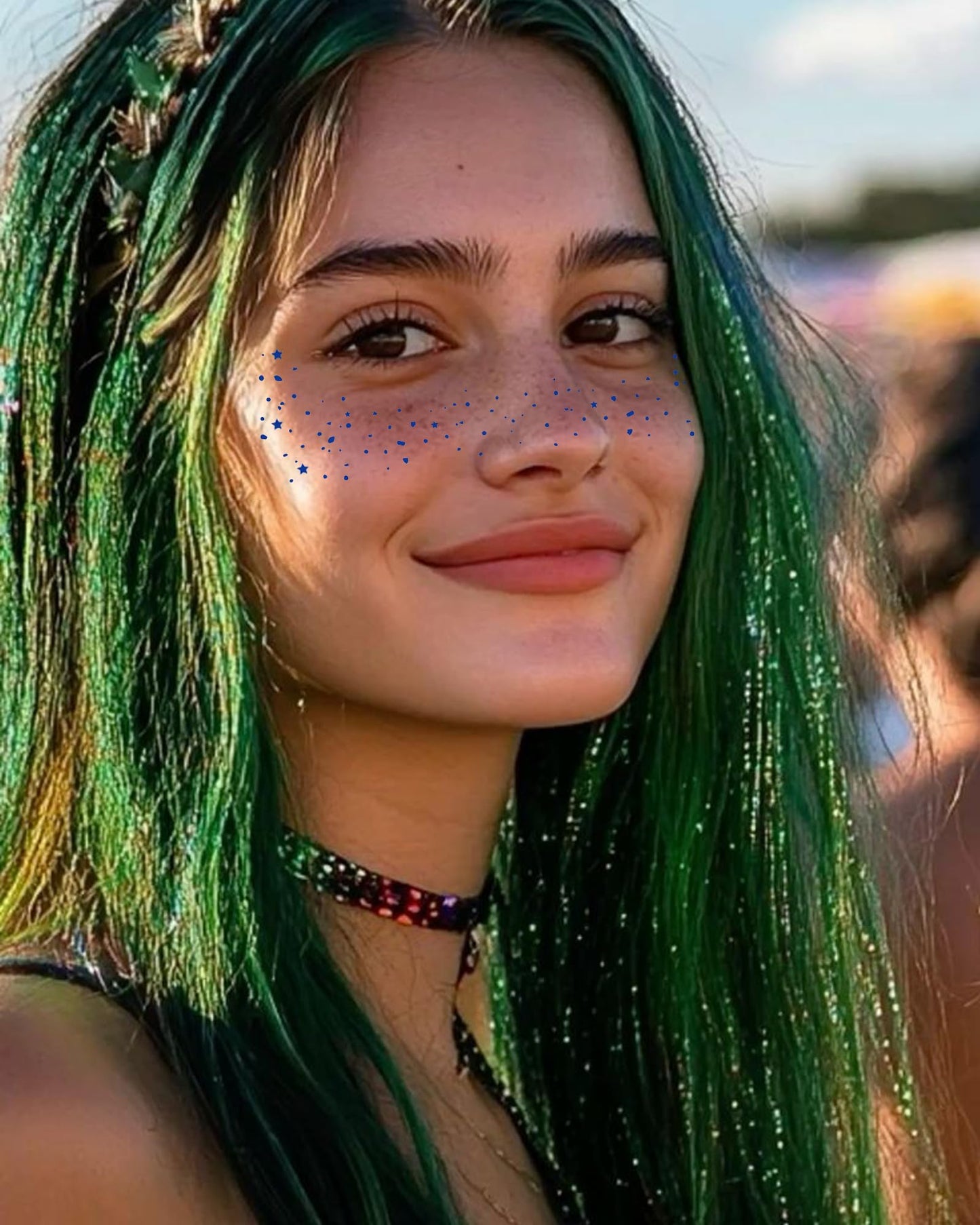Demonstration of removing gold glitter freckles patches easily using a cotton pad and baby oil.