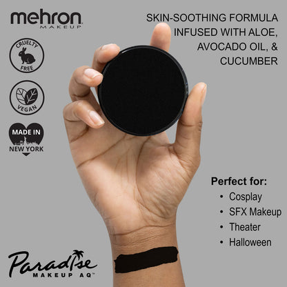 Mehron water activated professional black face paint cake open container displaying matte texture