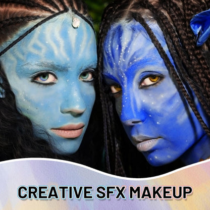 Large seventy milliliter tube of light blue special effects makeup next to cosmetic application brushes