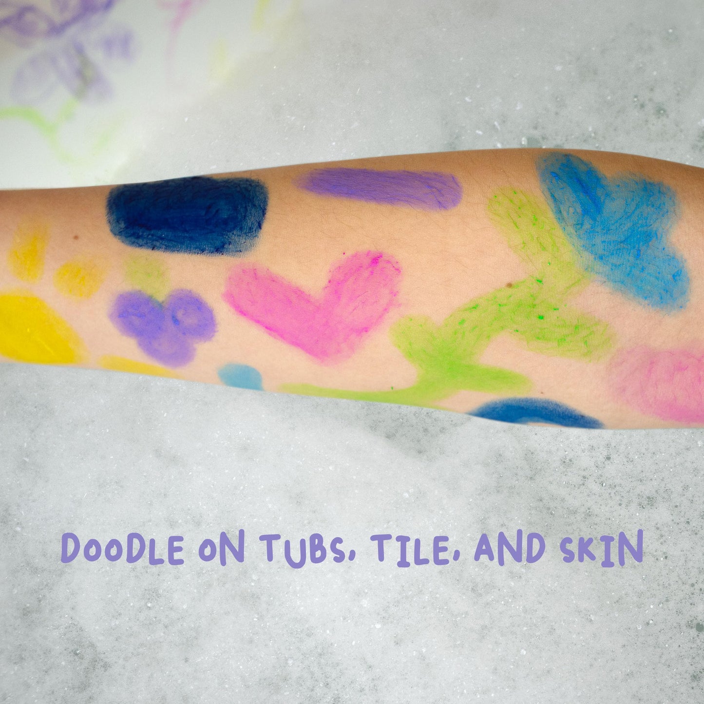 Child using Mr. Bubble bath paints on tub tiles