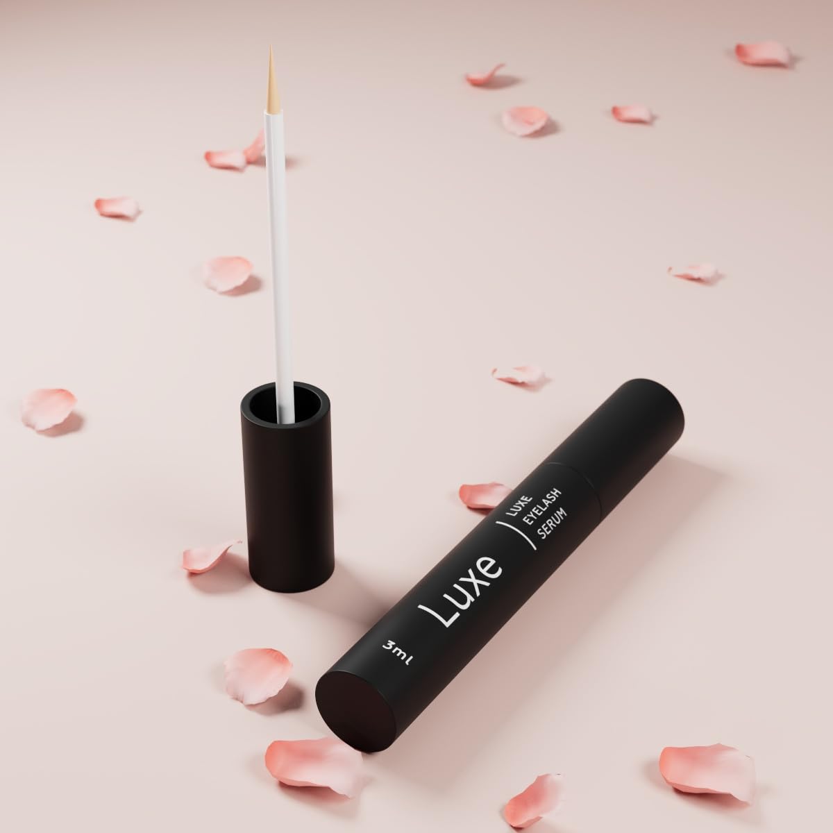 Close up of Luxe Cosmetics lash serum applicator brush