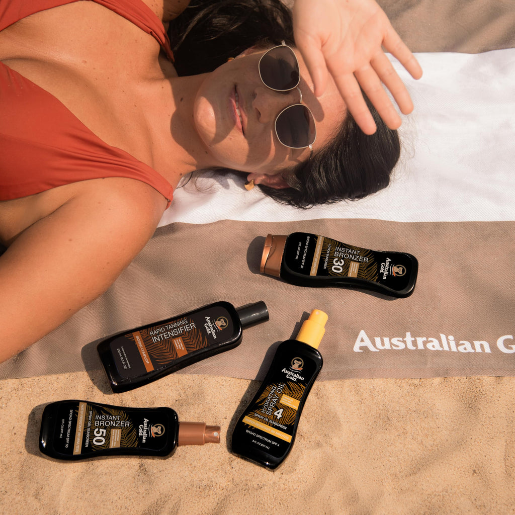 Australian Gold spray gel sunscreen texture demonstration on skin