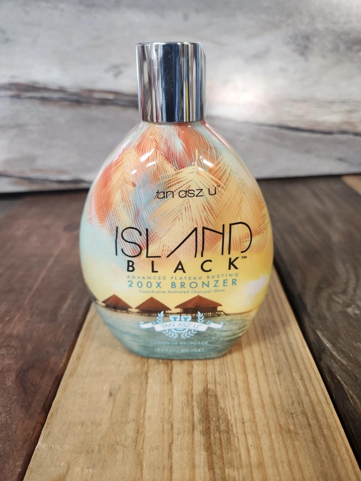 Tan Asz U Island Black 200X Bronzer lifestyle indoor tanning setup